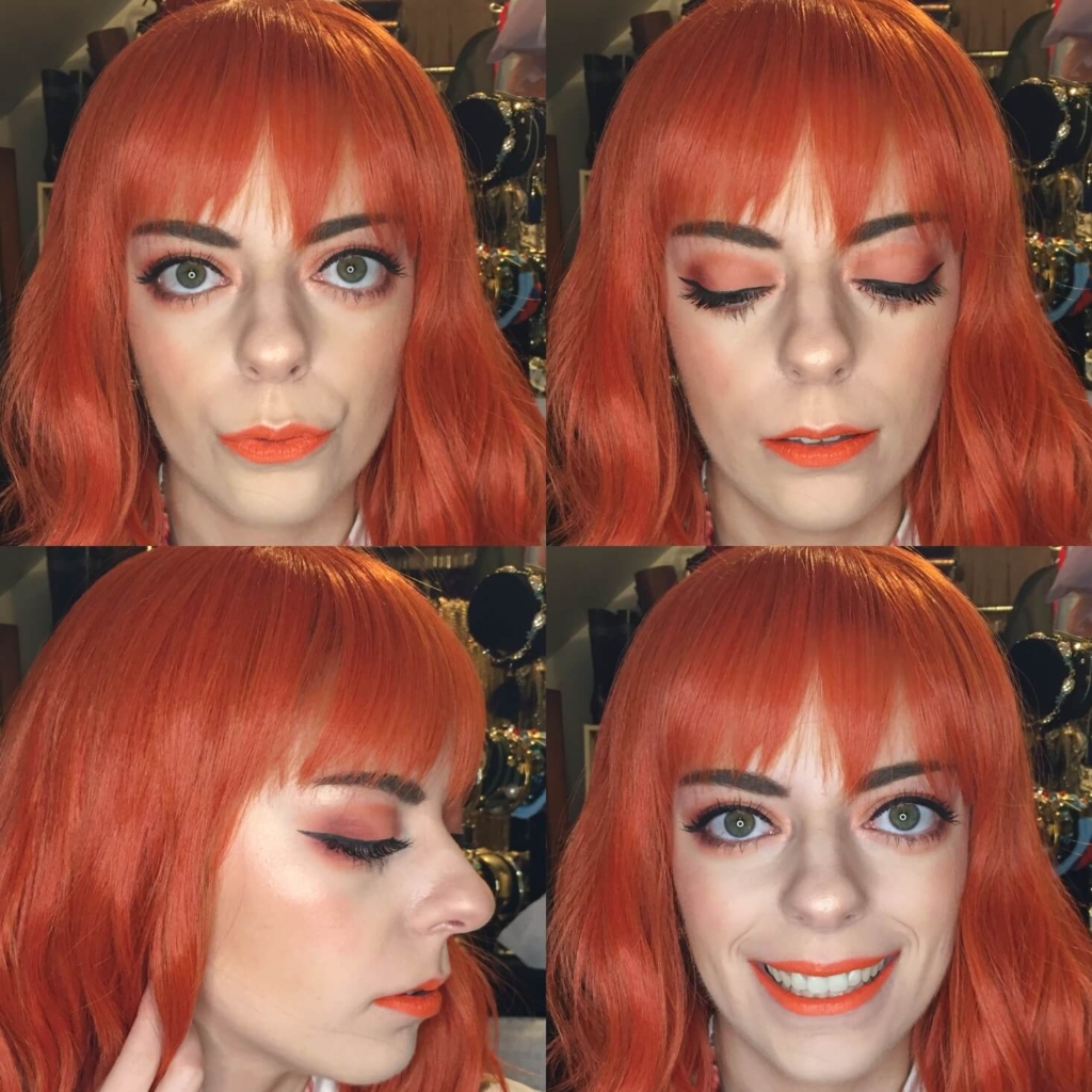 makeup look with an orange lip and eye