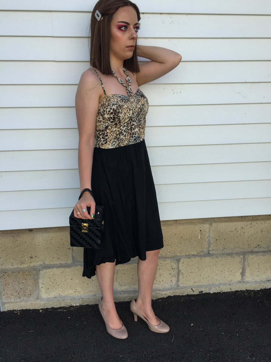 halter leopard top with black bottom dress outfit