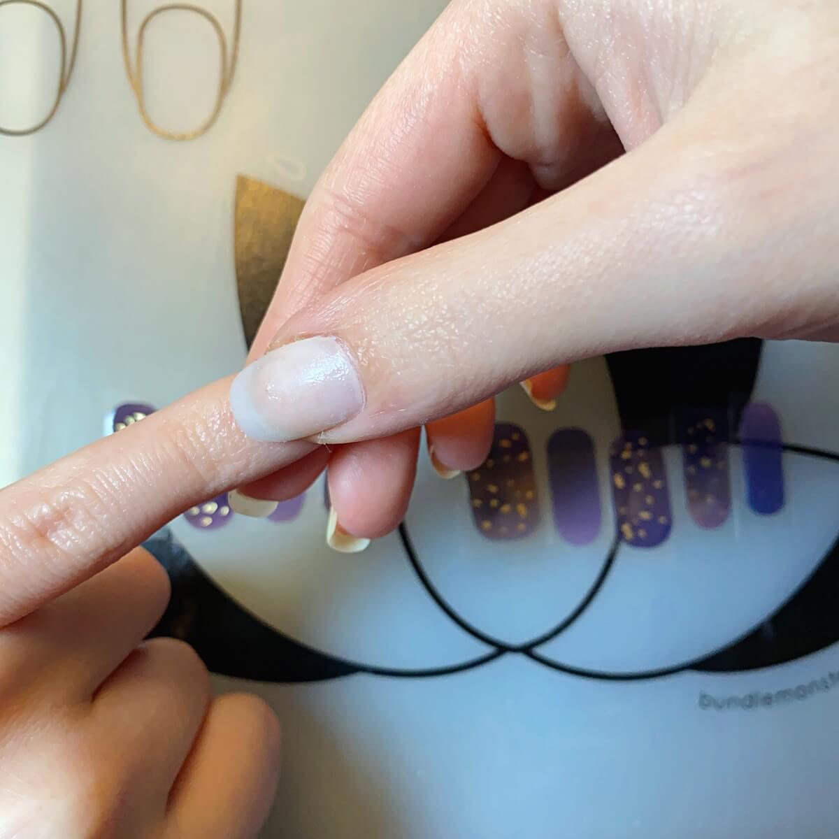 press and smooth gel nail sticker over nail