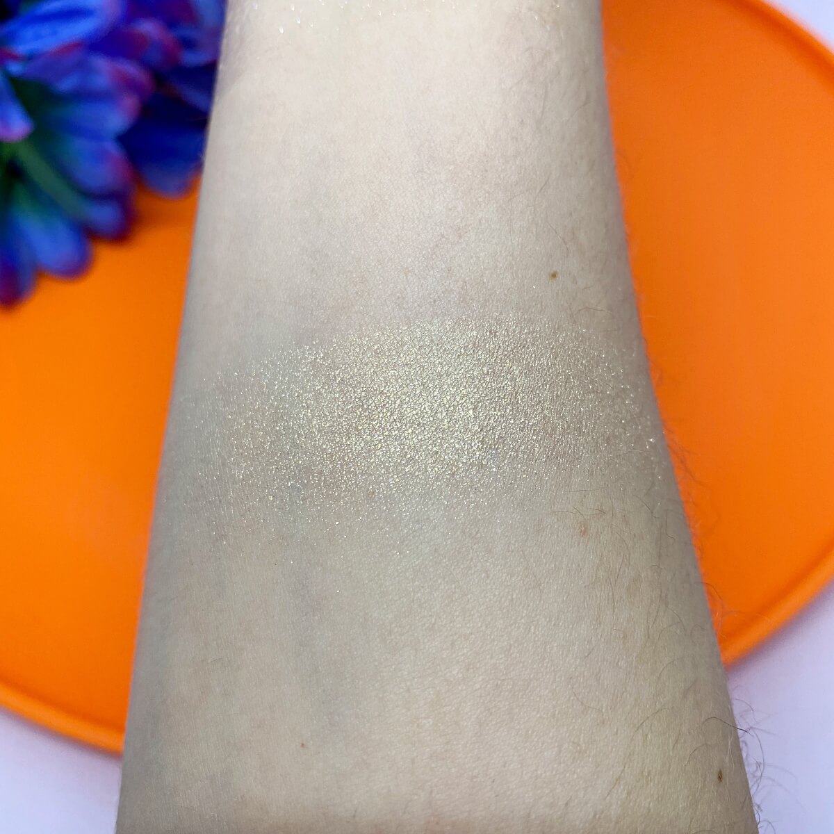 wet n wild Care Bears Let Your Light Shine Highlighter swatch