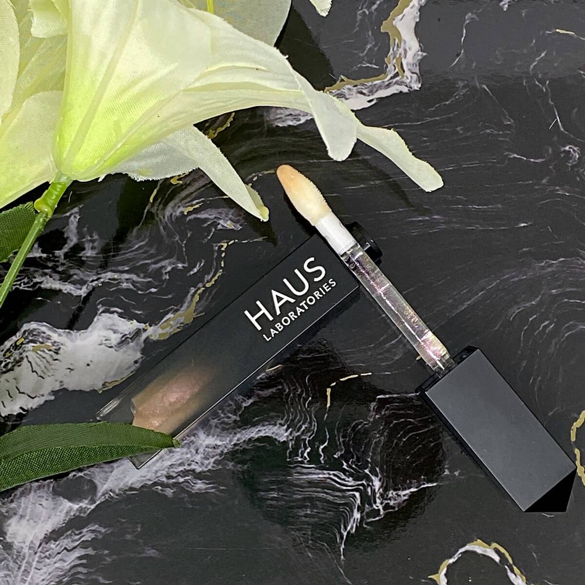 haus labs Le Riot Lip Gloss in Entranced