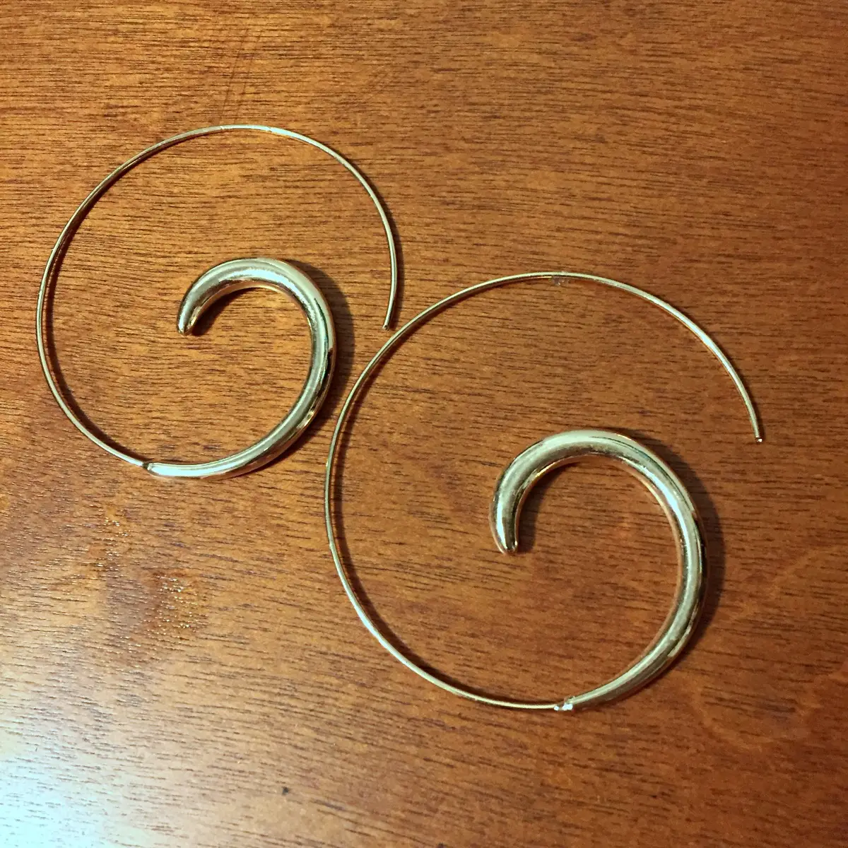 gold spiral hoop earrings