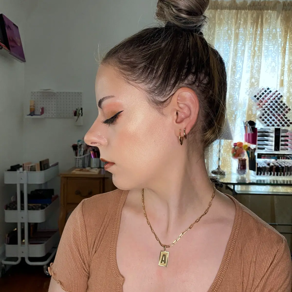 wearing elf Halo Glow Liquid Filter mixed into foundation