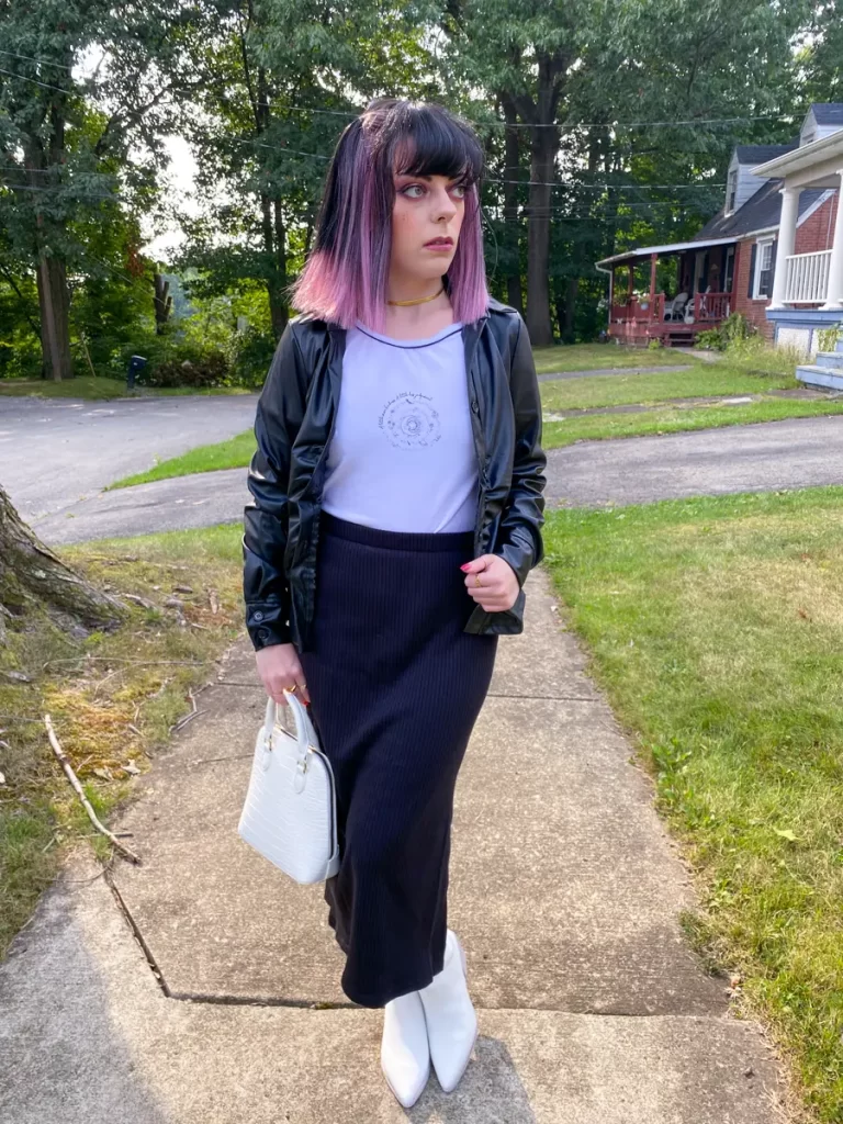 graphic tee layered with leather shirt outfit