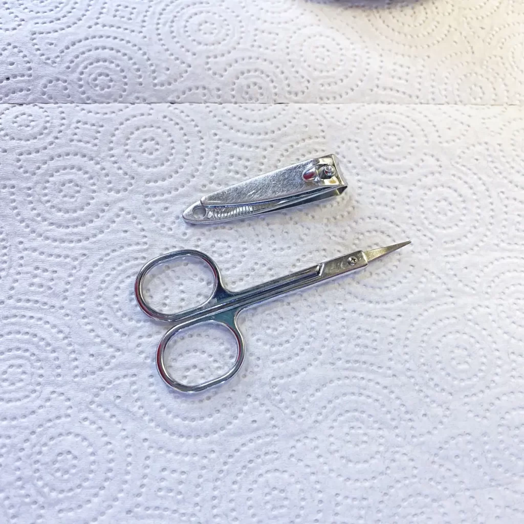 cuticle scissors and nail clipper