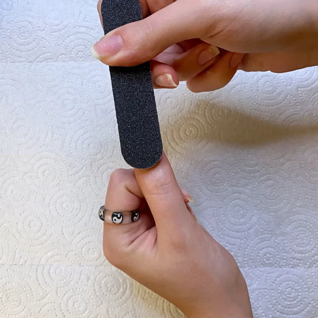 filing the surface of natural nails