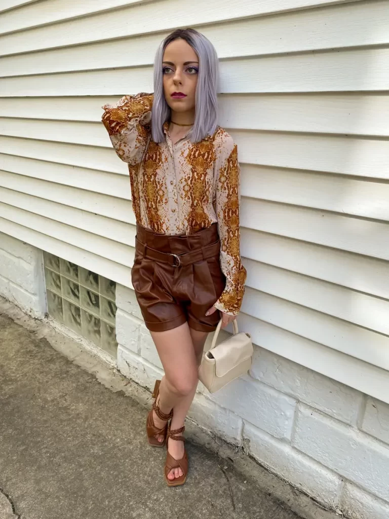dressy blouse with leather shorts outfit