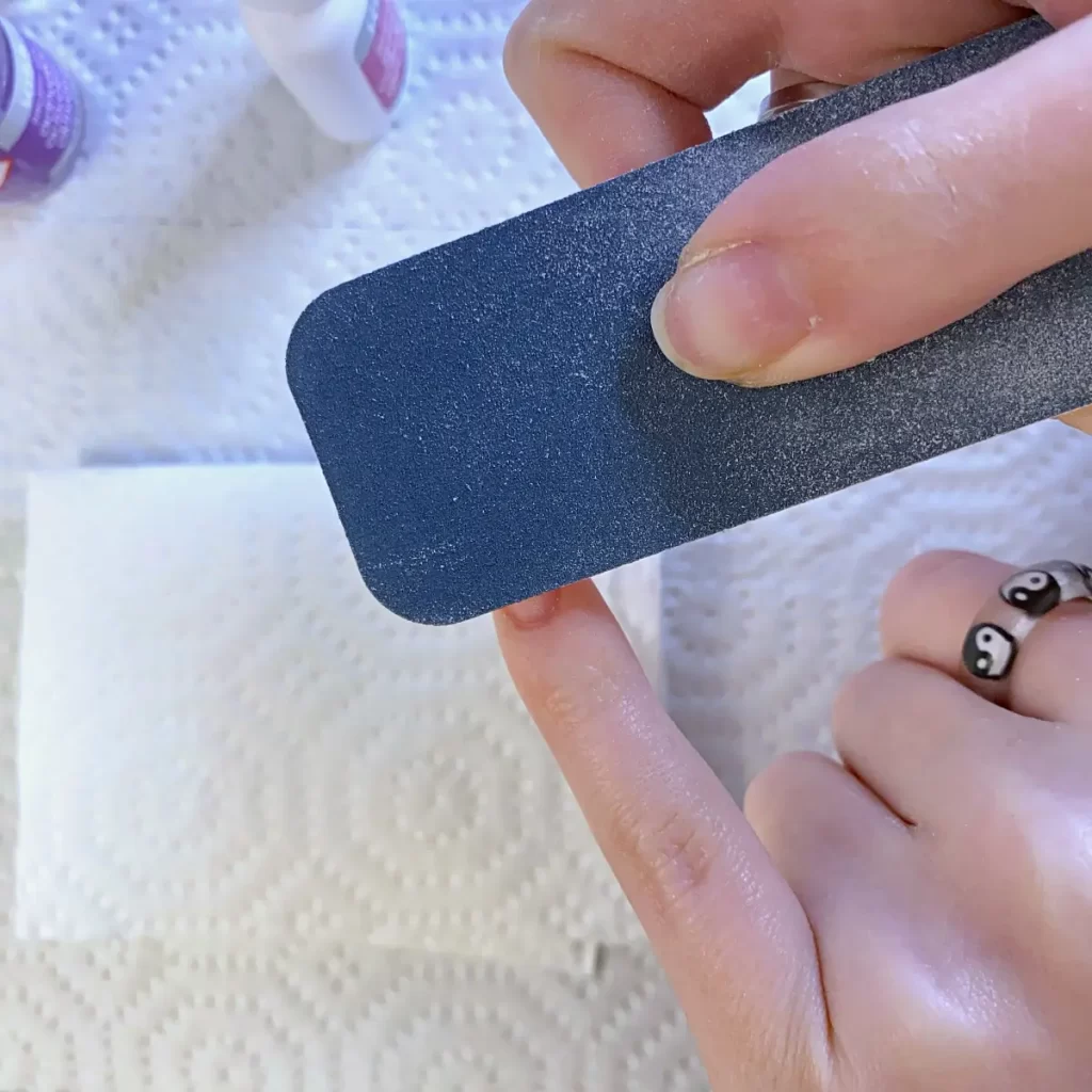 buff the seam of half cover nail tips