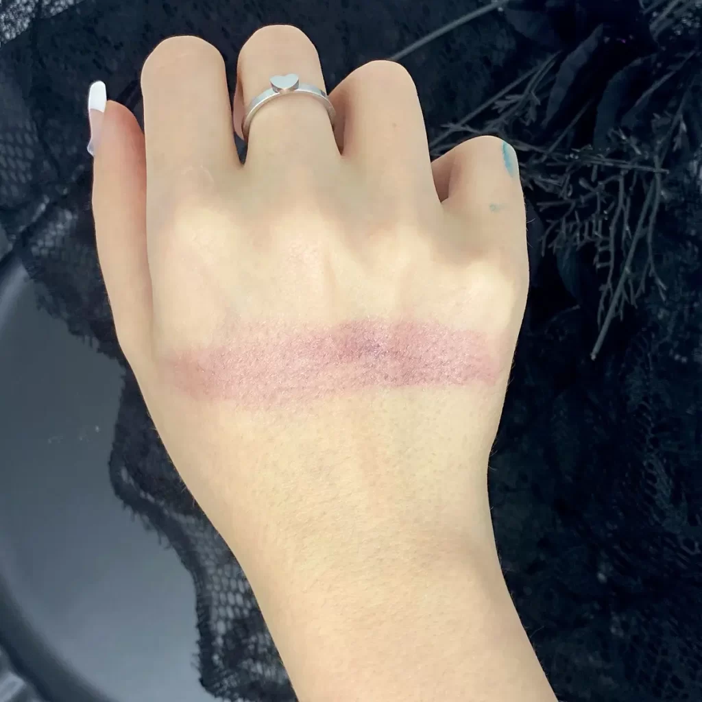 wet n wild Fantasy Makers Color-Changing Cream Blush in Berry But Black swatch