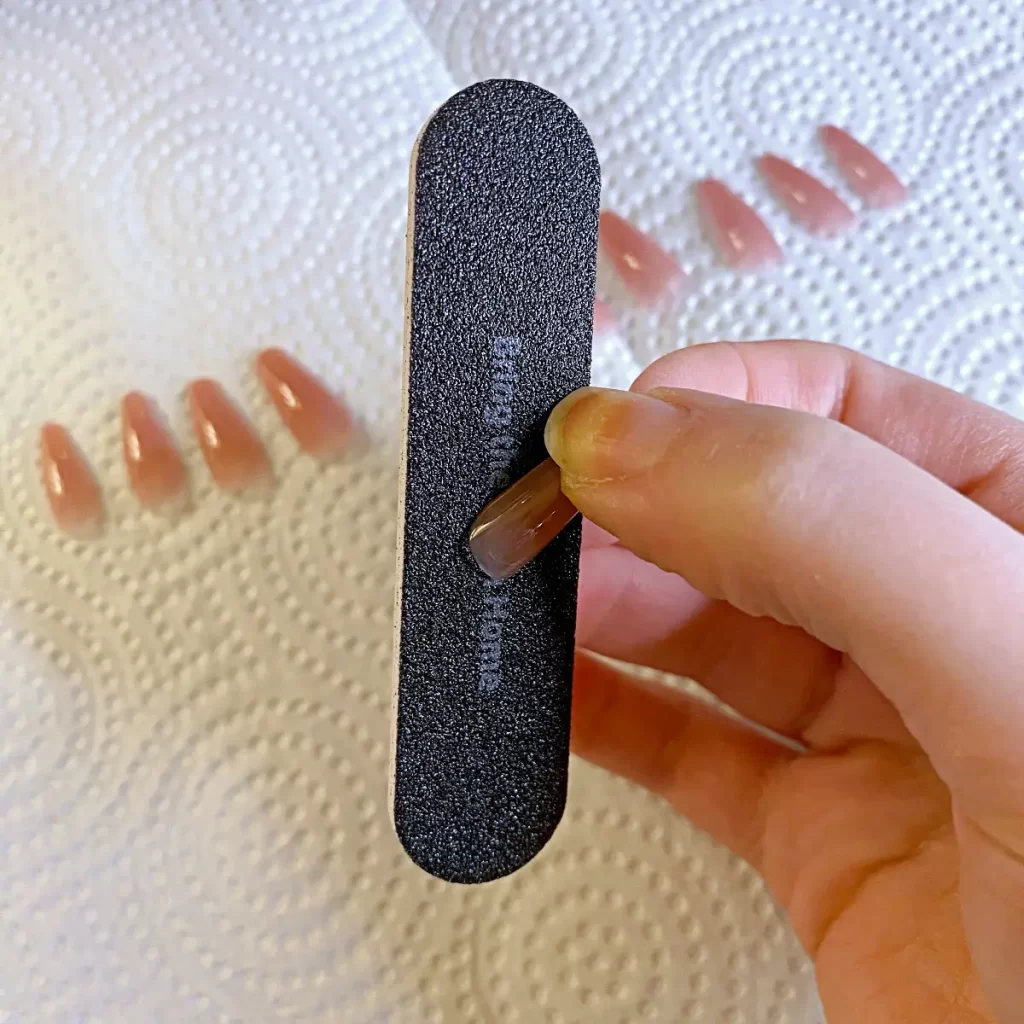 file sides of fake nails for a custom fit
