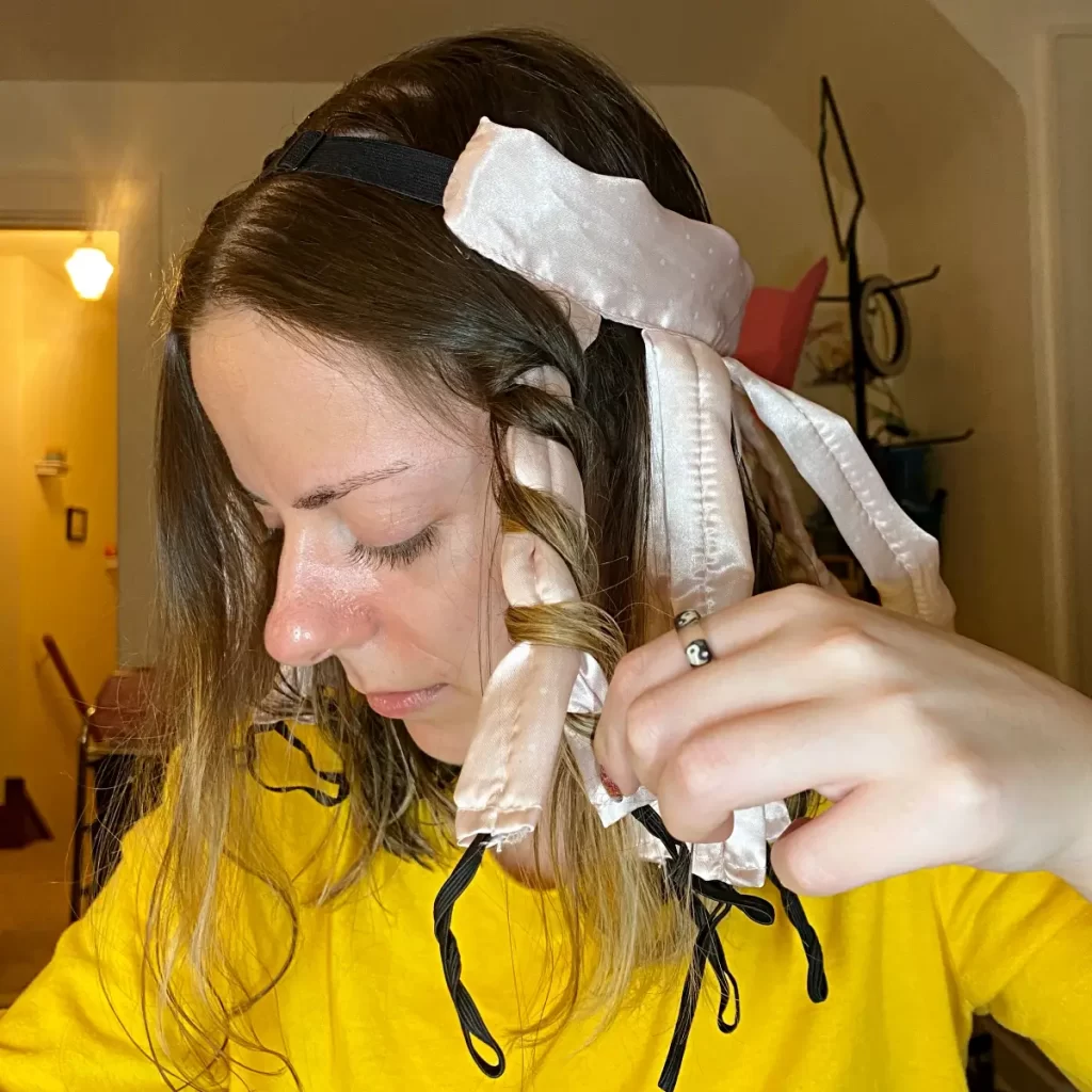 Take a section of hair and place it in the Octocurl