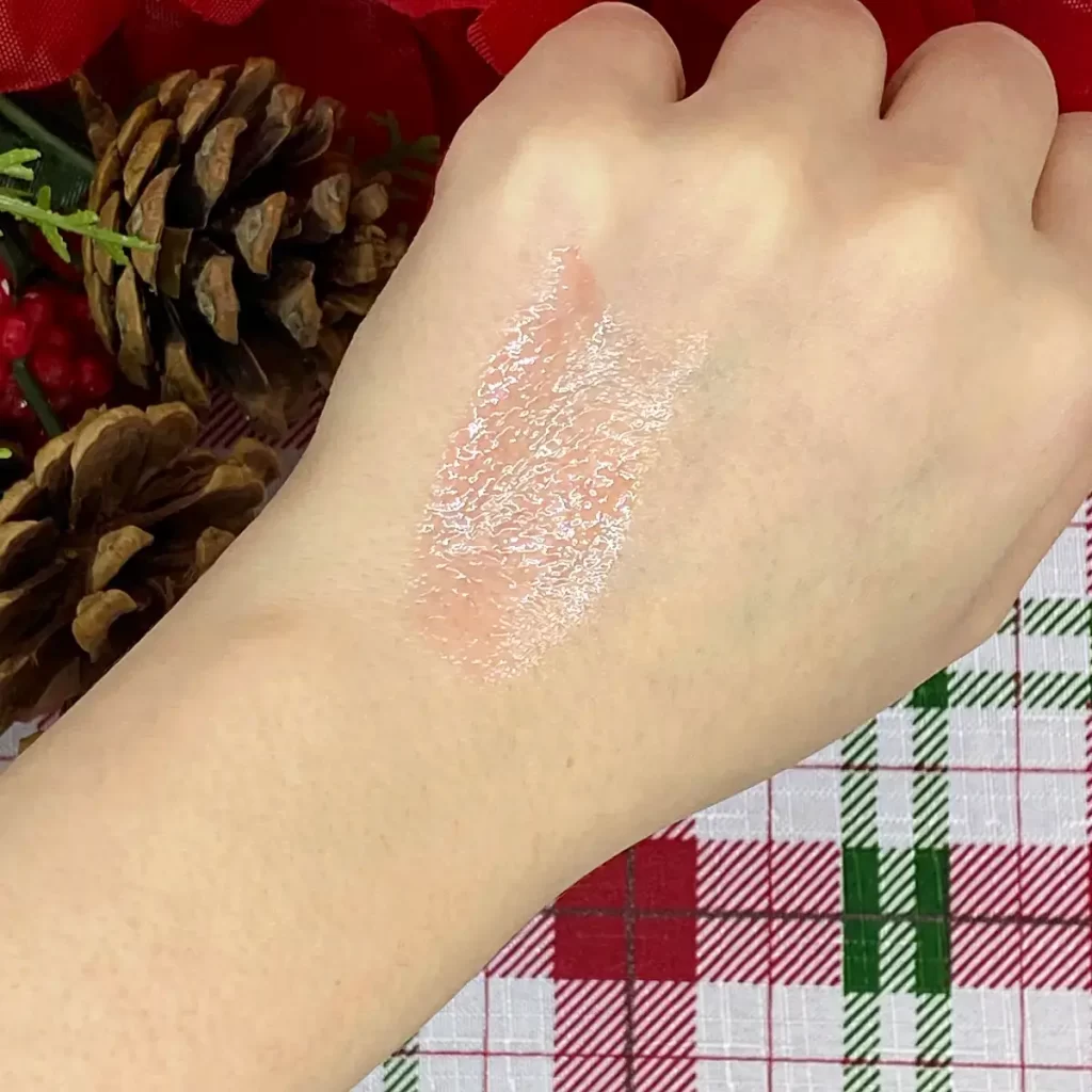 wet n wild holiday Holiday Lip Oil in Cookie Sweet swatch