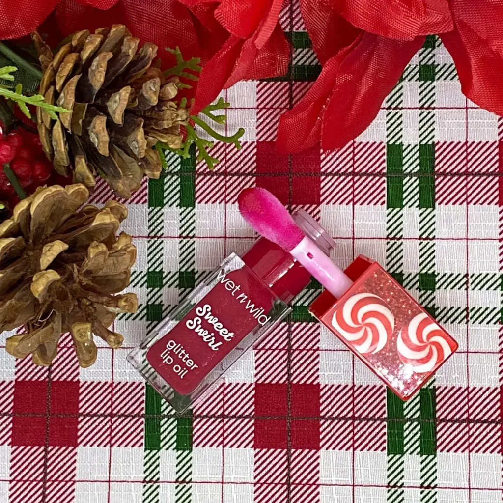 wet n wild holiday Glitter Lip Oil sweet swirl