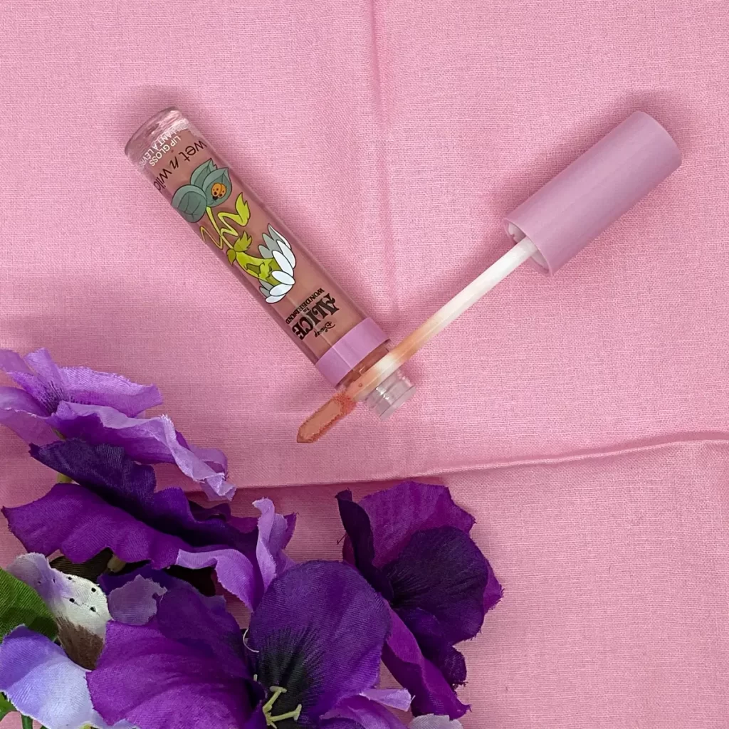 wet n wild Alice in Wonderland Lip Gloss wildflower